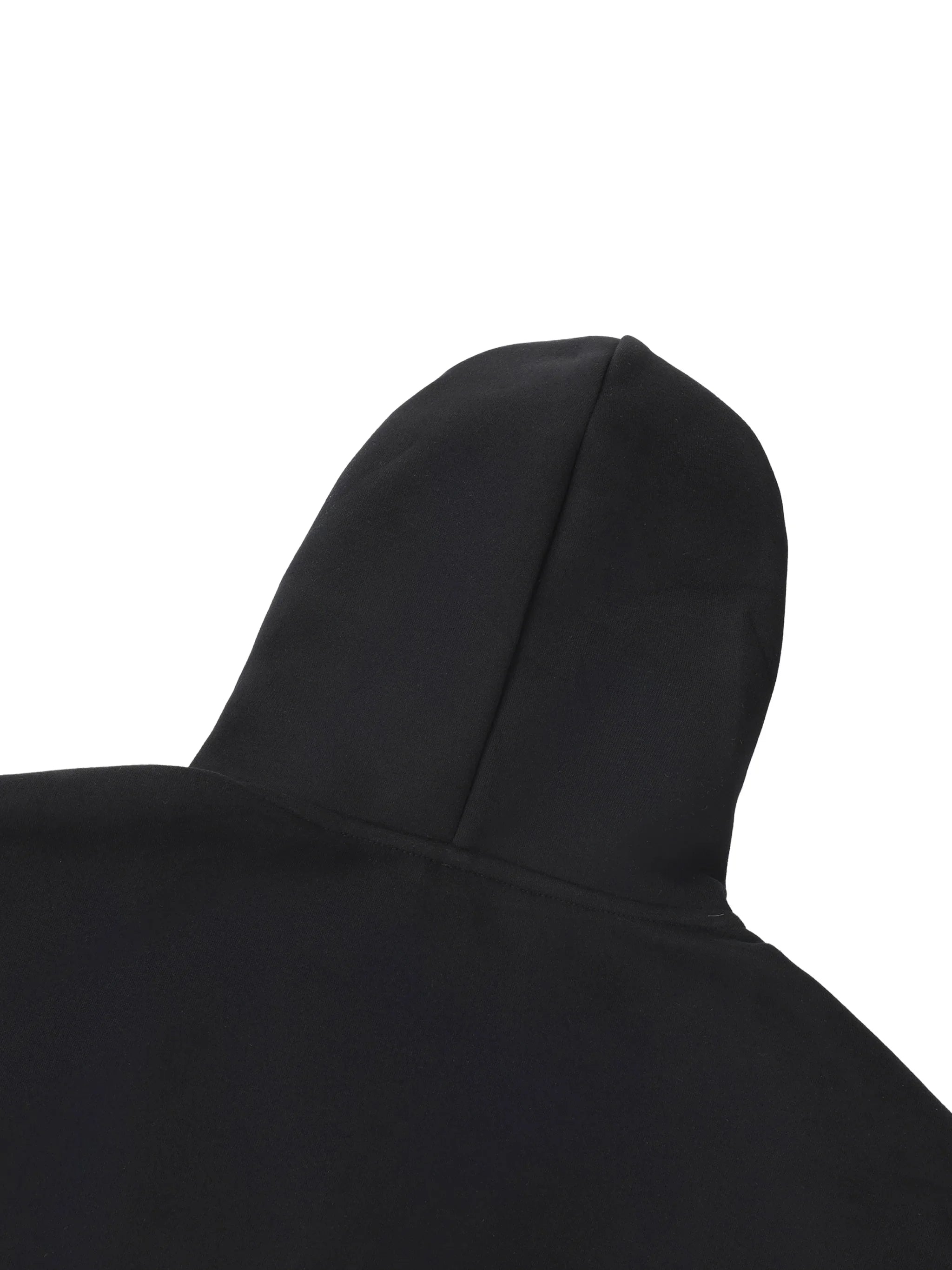 Close-up of a black heavyweight hoodie hood, minimalist streetwear style