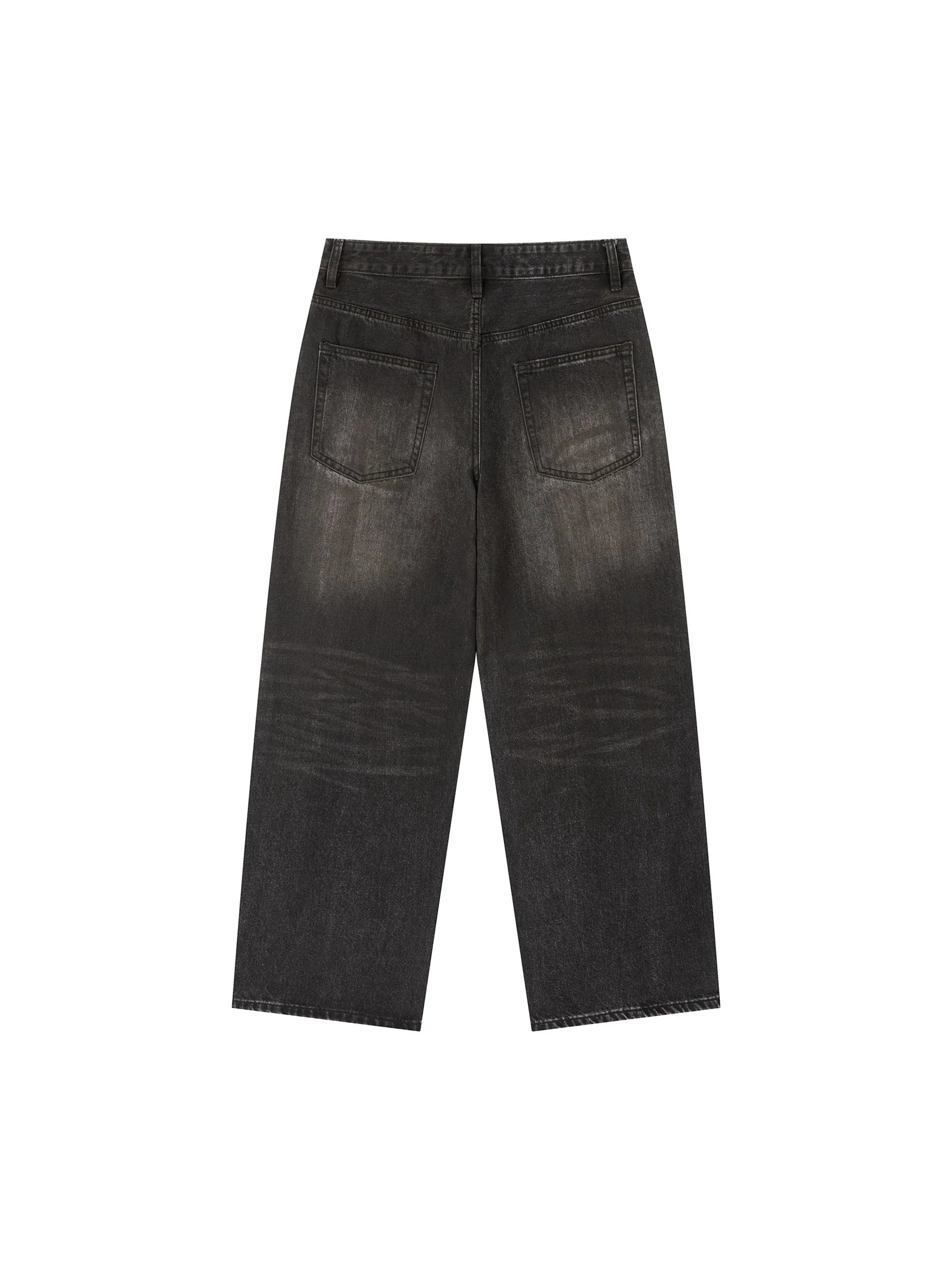 Back view of black wide-leg jeans with washed vintage finish and two rear pockets